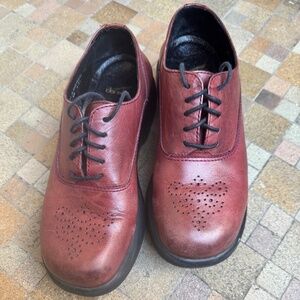 Women's Dansko lace clogs